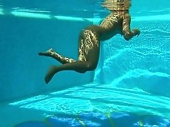 Sexy girl goes skinny dipping as we watch underwater