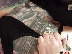 Marie Bossette gets a painful tattoo on her leg