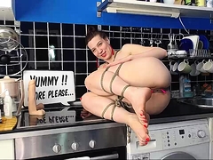 Kinky webcam wife explores her fetish fantasy in the kitchen